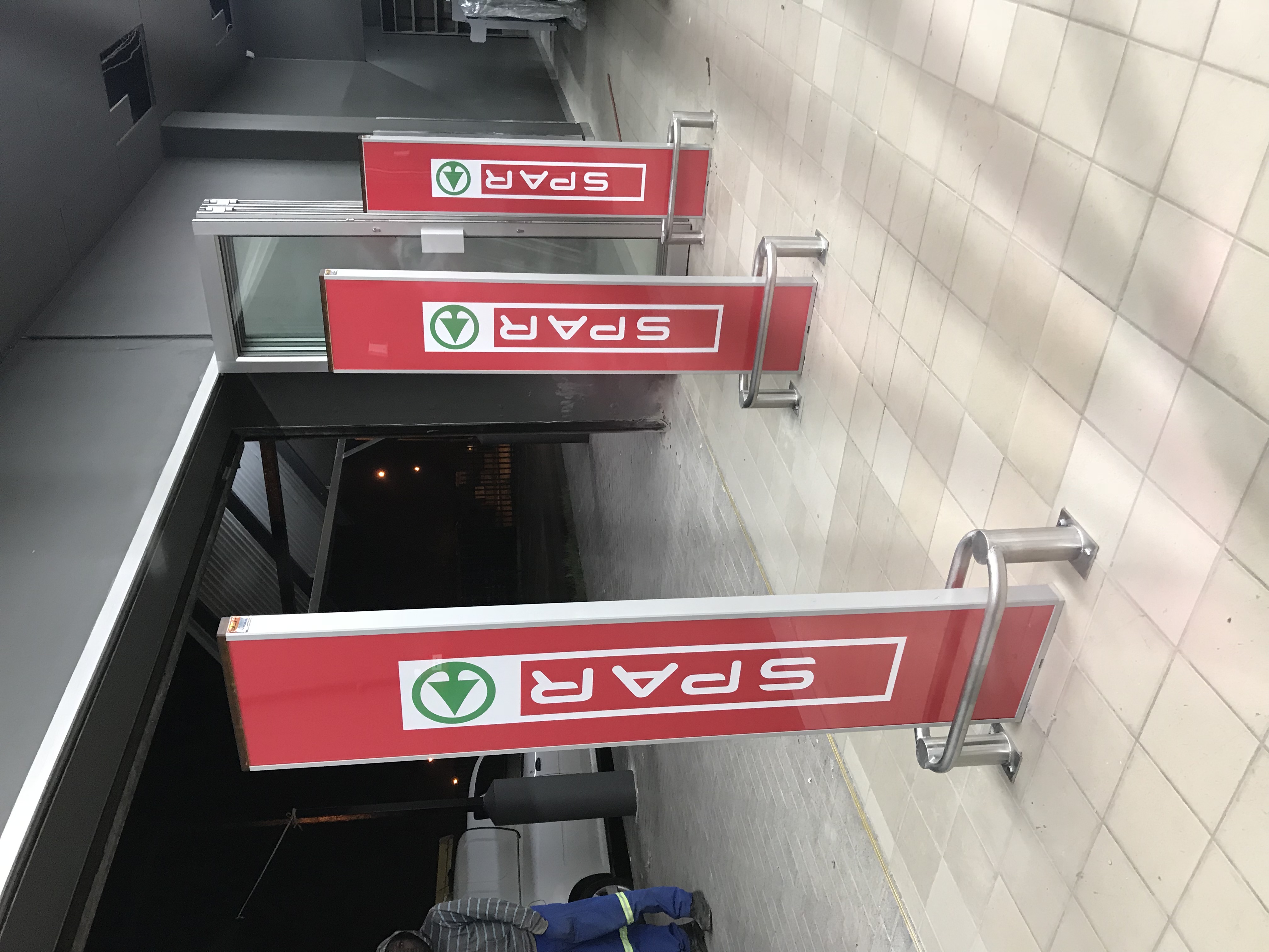 Installed EAS pedestal system at a supermarket entrance